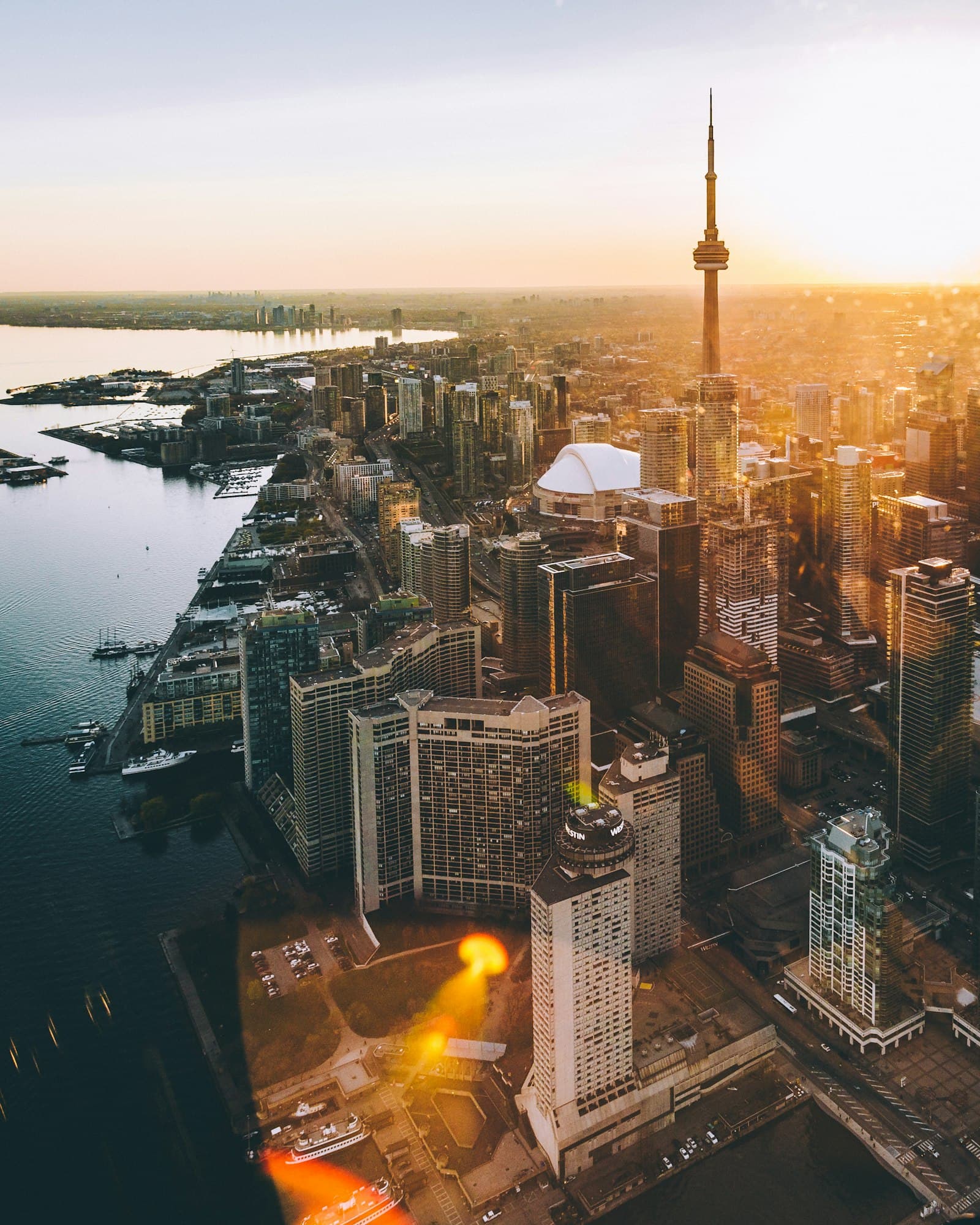 The Toronto skyline at dusk with the CN Tower lit up